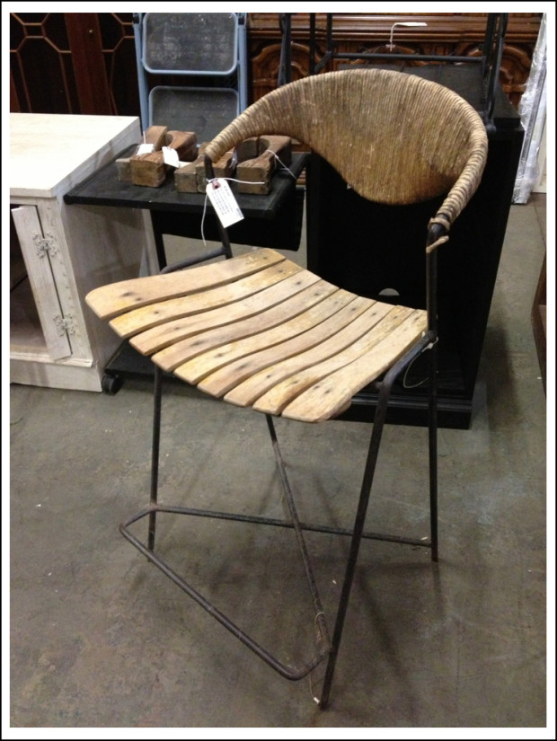Very cool, wrought iron-base bar stool.