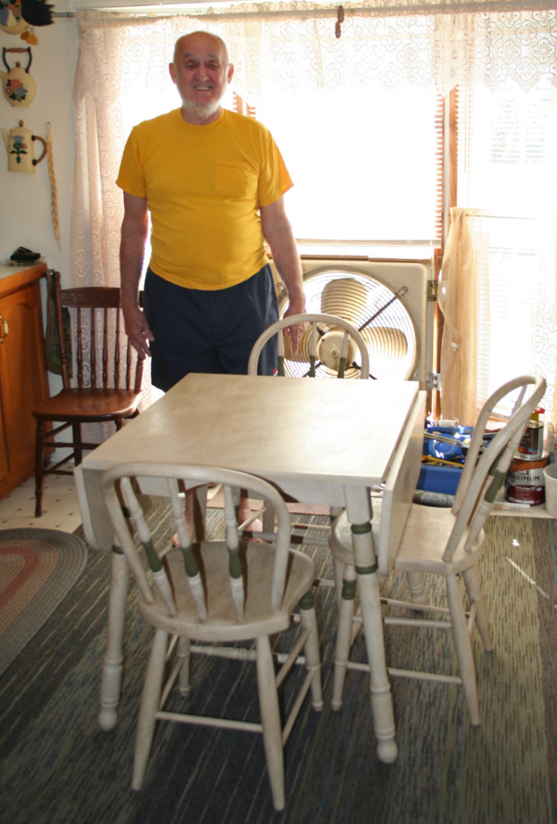 Dad with his new dining set.