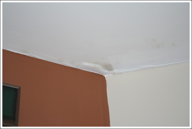 Water damage just outside of bedroom.