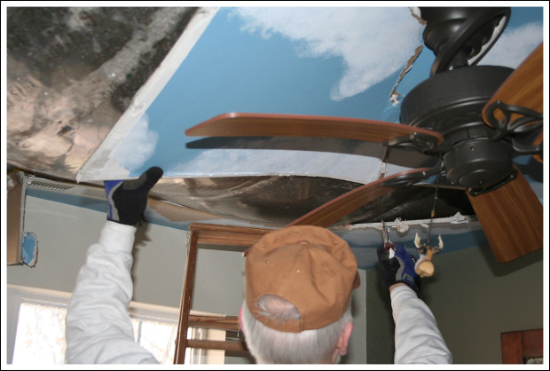 Removing more drywall.