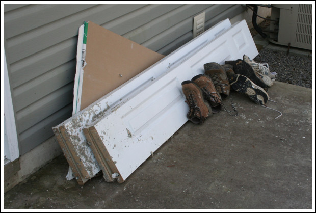 Ruined closet doors that Hubby removed during previous visit.