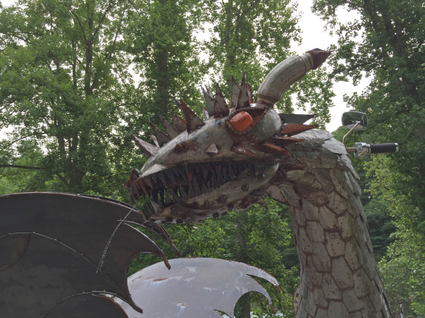 dragon sculpture fashioned from bike and car parts.